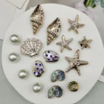 16PCS FAI DA TE Stelle Marine Pendenti e Ciondoli Bling Conchiglia Scarpe Fibbia Decorazioni Guscio Rimovibile Accessori per Scarpe Multifunzionale Clip per Scarpe