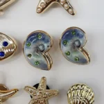16PCS FAI DA TE Stelle Marine Pendenti e Ciondoli Bling Conchiglia Scarpe Fibbia Decorazioni Guscio Rimovibile Accessori per Scarpe Multifunzionale Clip per Scarpe